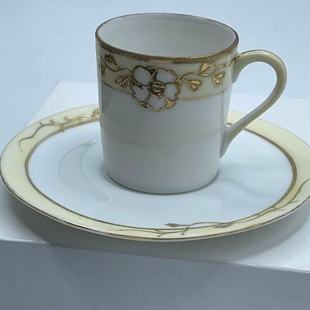 Vintage Nippon porcelain hand painted demitasse  cup & saucer.